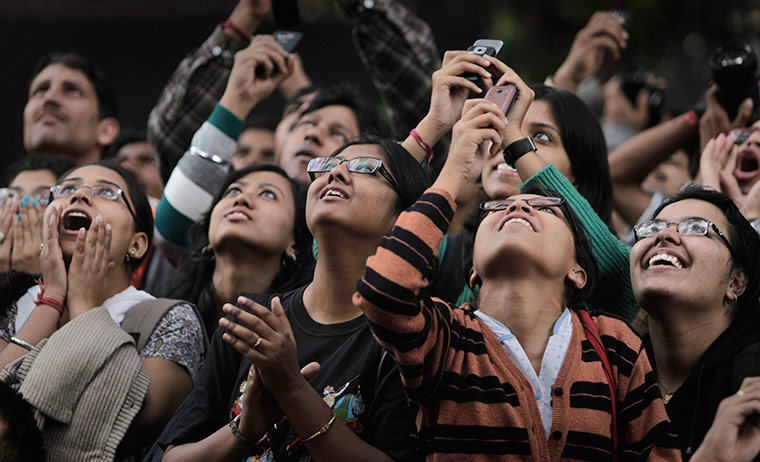 24 hours in pics: Indians look up at artists from Project Bandaloop