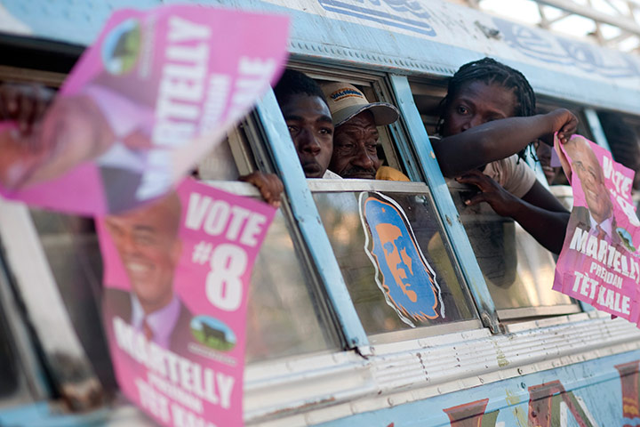 24 hours in pics: Supporters of Haitian presidential candidate Michel Martelly