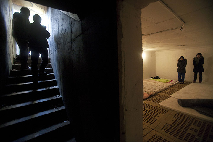 korea crisis: South Korean women take cover inside a bomb shelter