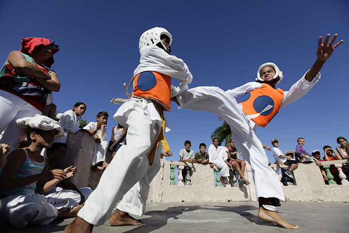 24 hours in pictures: Taekwondo exhibition match in Cuba