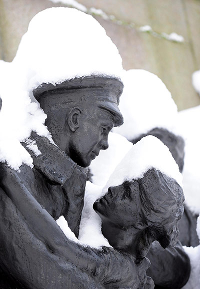 Snow and freezing hits uk: The War Memorial in Newcastle City centre looks like a snow sculpture
