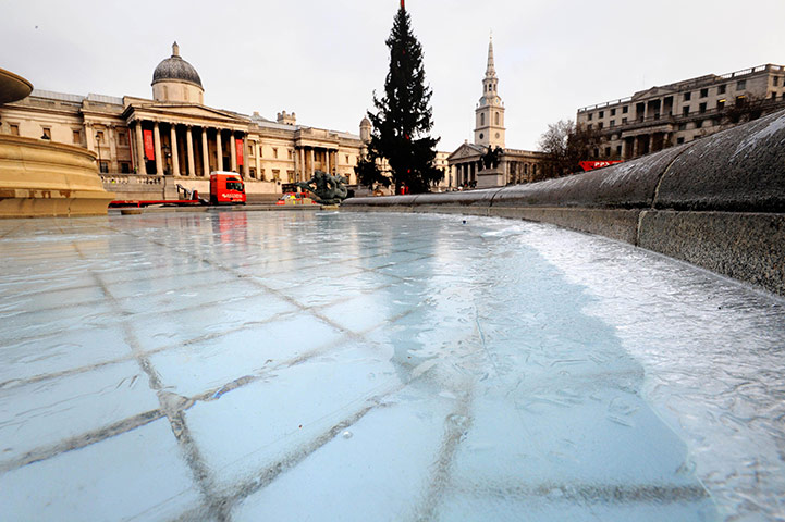 Snow and freezing hits uk: The Christmas Tree donated by Norway is seen in Trafalgar Square