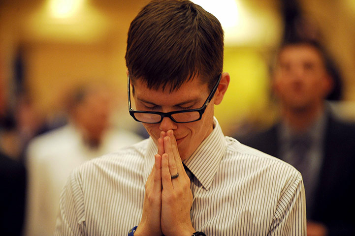 Midterm Election night : A supporter prays at the Nevada Republic party