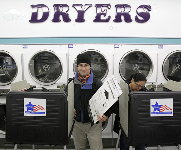 24hours in pics: Gary Dzik prepares to cast his ballot at the Su Nueva Laundromat
