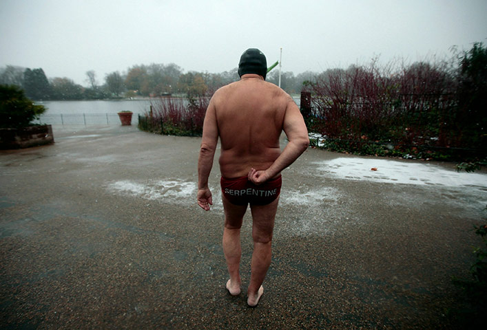 24 hours in pictures: Man goes swimming in freezing waters of the Serpentine Lido in Hyde Park