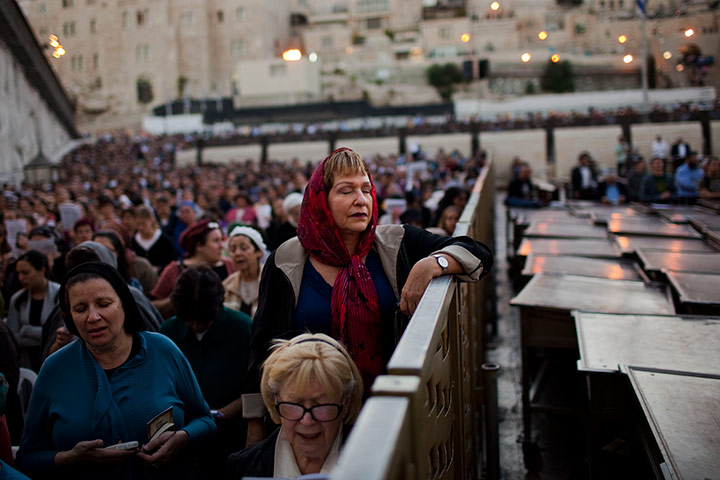 24 hours in pictures: Jewish women take part in a special prayer for rain at the Western Wall