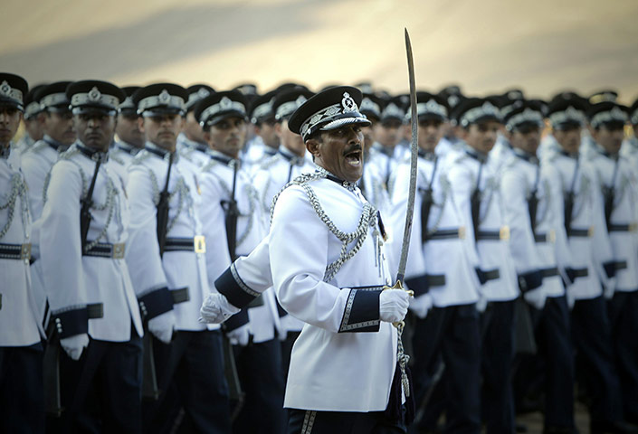 24 hours in pictures: Omani troops march during a military parade