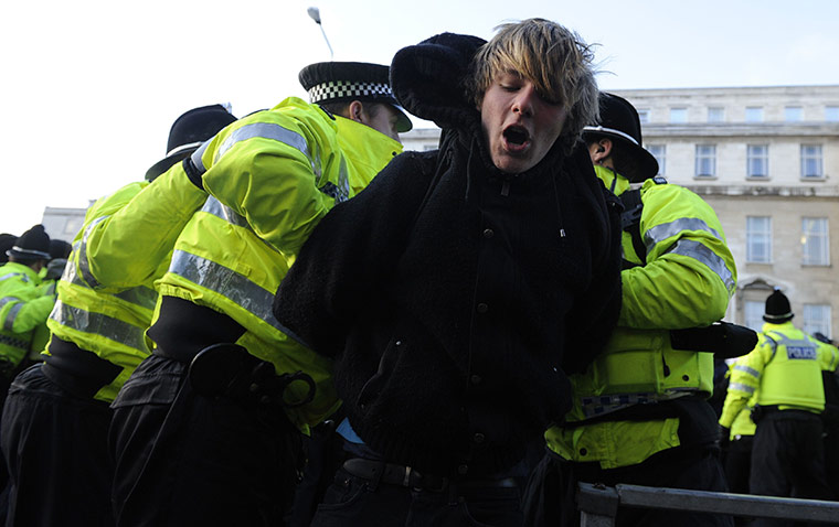 Police detain protester in Leeds