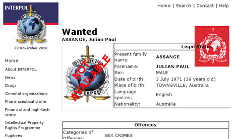 Interpol poster for Julian Assange