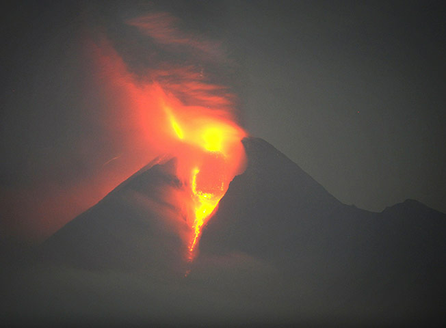 Mount Merapi Update: Molten lava and searing ash clouds shoot from the crater of Mount Merapi 