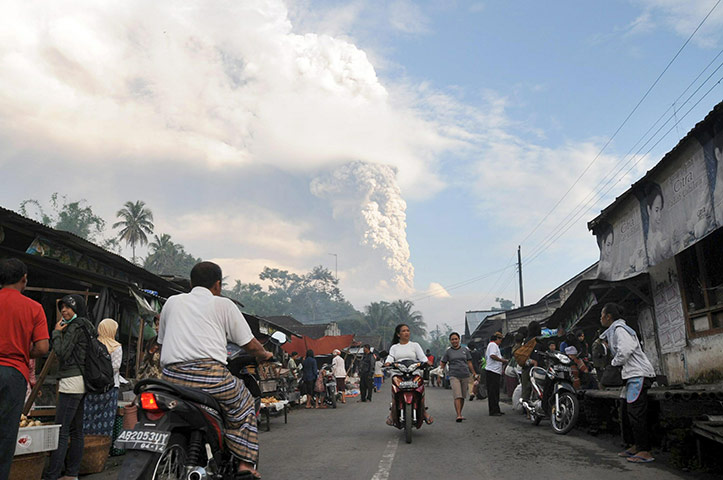 Mount Merapi Update: A cloud of ash rises from the Mount Merapi volcano