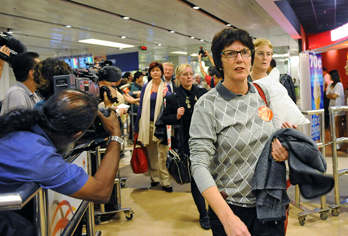 Qantas engine failed: Passengers are escorted from the termina