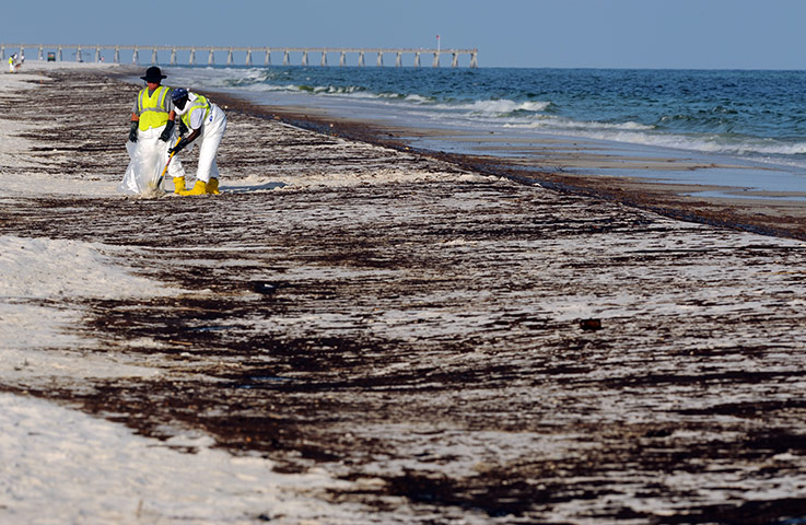 Week In Business: Crews work to clean up oil washed ashore at Pensacola Beach