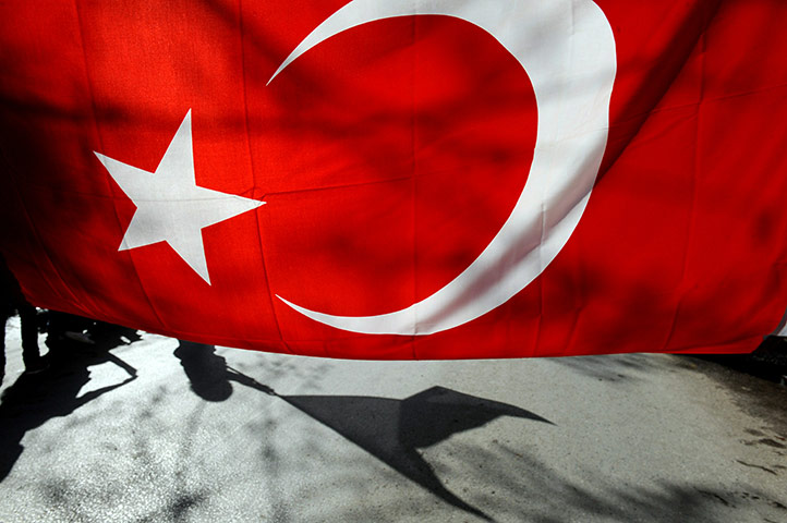 24 Hours: Kosovo residents wave a Turkish flag during visit of Turkish Prime Minister