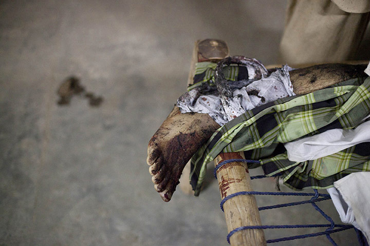 24 Hours: A victim of the suicide bomb attack inside a mosque in Darra Adam Khel