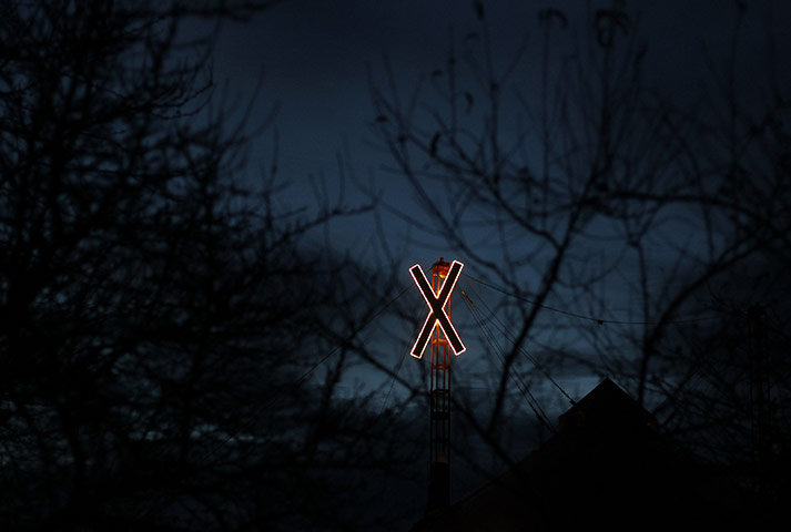24 Hours: An illuminated cross representing anti-nuclear protest in Germany
