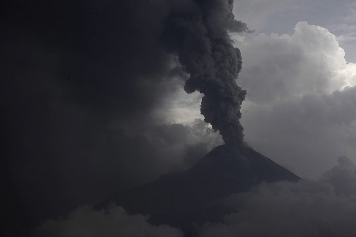 24 Hours: Mount Merapi volcano erupts spewing out clouds of hot gas and debris