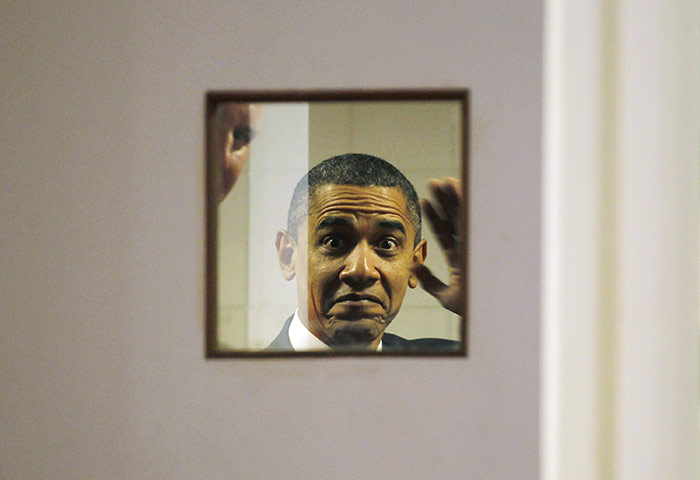 Obama in India: U.S. President Barack Obama waves to photographers in Mumbai