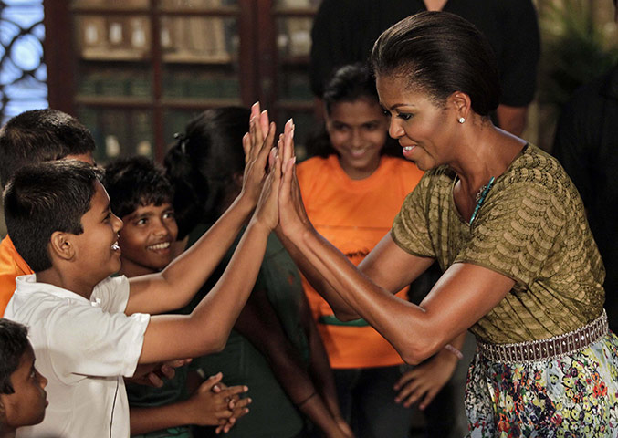 Obama in India: First lady Michelle Obama plays with underprivileged children in Mumbai