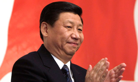 File photo of Chinese Vice President Xi Jinping applauding in Moscow