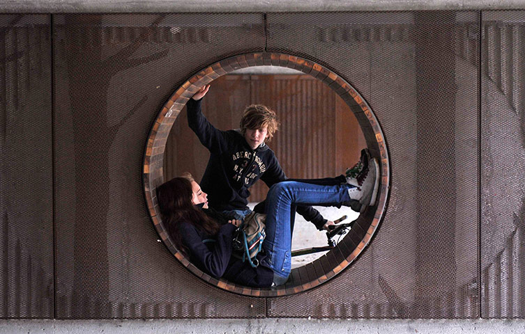 24 hours pics: Youths speak in an underpass in Ljubljana