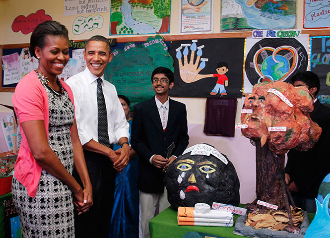 Obamas in India: Barack and Michelle Obama visit the Holy Name High School in Mumbai
