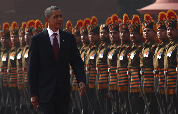 Obama India: Obama inspects an honour guard during an official arrival ceremony