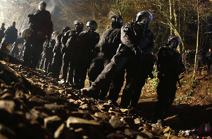 Anti-nuclear protests: German riot police wait in line before they remove anti-nuclear activists