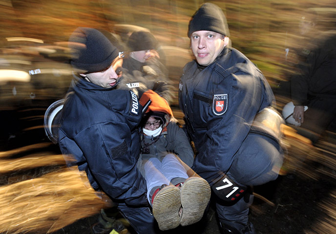 Anti-nuclear protests: Police carry away an anti nuclear demonstrator who blocked the rails