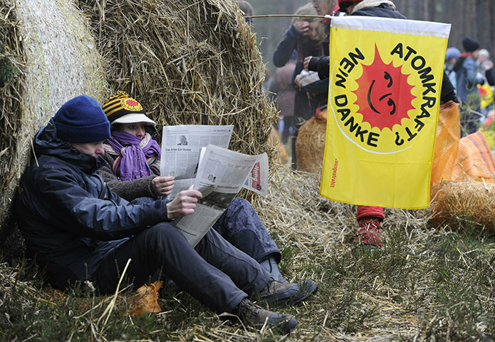 Anti-nuclear protests: Anti-nuclear protesters read newspapers at their blockade