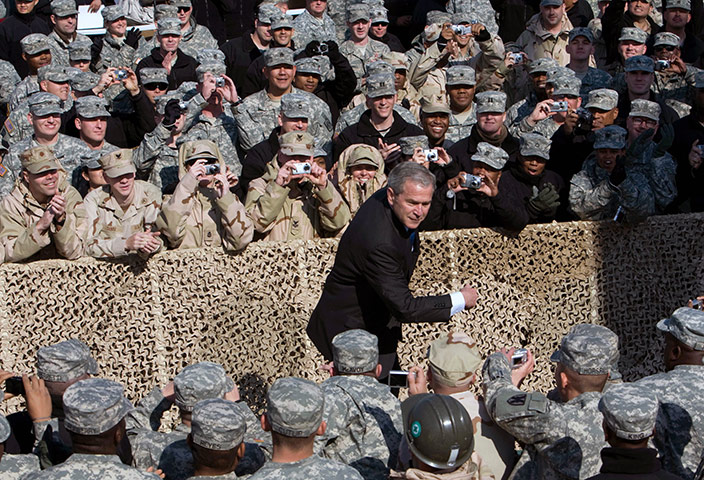 George W Bush: 12 January 2008: US President George W Bush greets US soldiers in Kuwait