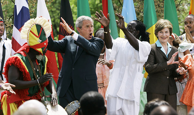 George W Bush: 25 April 2007: President Bush dances with Kankouran African Dance Company 