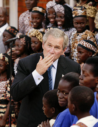 George W Bush: 11 July 2003: President George W Bush visits an AIDS clinic in Uganda