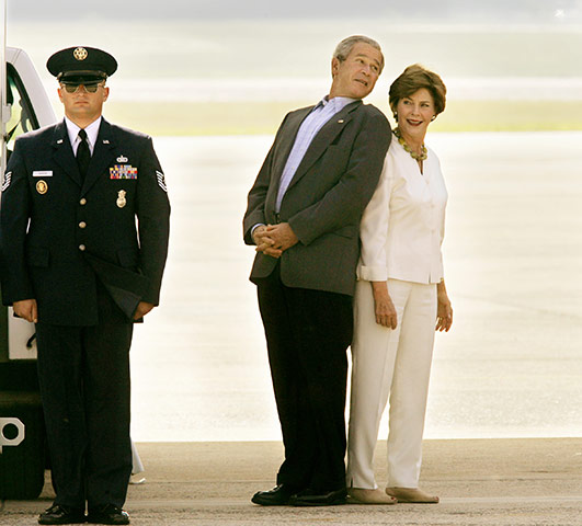 George W Bush: 30 June 2006: President Bush teases first lady Laura Bush