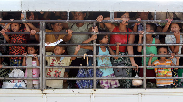 Burma refugees: Burmese refugees are transported on a truck