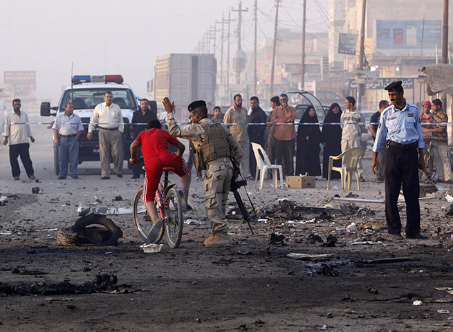 24 hours in pictures: car bomb attack in basra