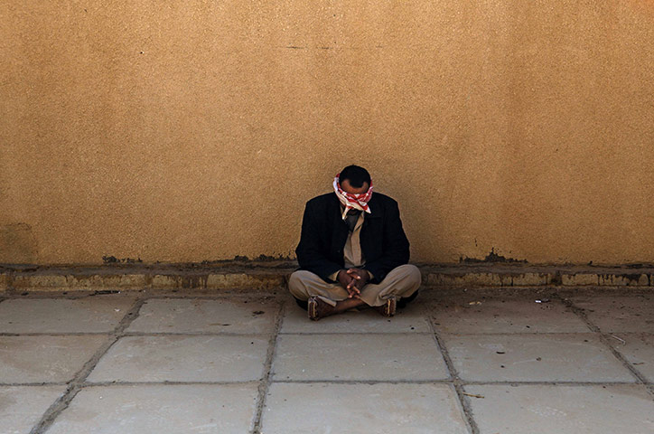 24 hours in pictures: a suspected bomb maker in iraq