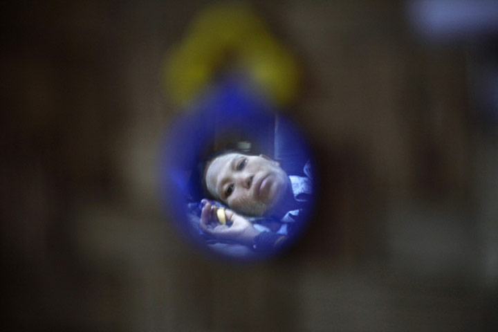 AIDS World day: A patient is reflected on a mirror 