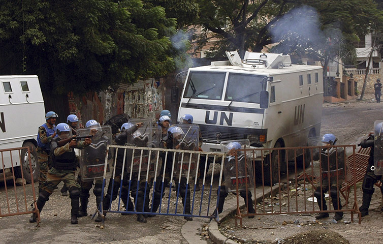 Violence in Haiti: U.N policemen regroup during clashes in Petion Ville