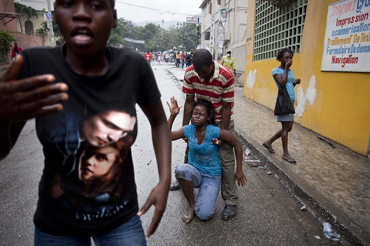 24 hours in pictures: Port-au-Prince, Haiti: People are affected by tear gas 