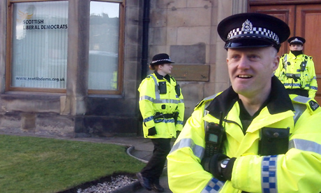 Police outside the Edinburgh Lib Dem office in Cliffton Terrace | pic: Michael MacLeod