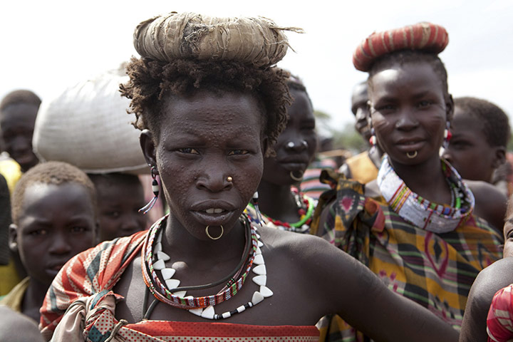 24 Hours in Pictures: A woman from the Toposa tribe of southern Sudan