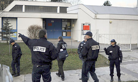 Police officers at the Charles Fourier pre-school in Besancon, where children are being held hostage
