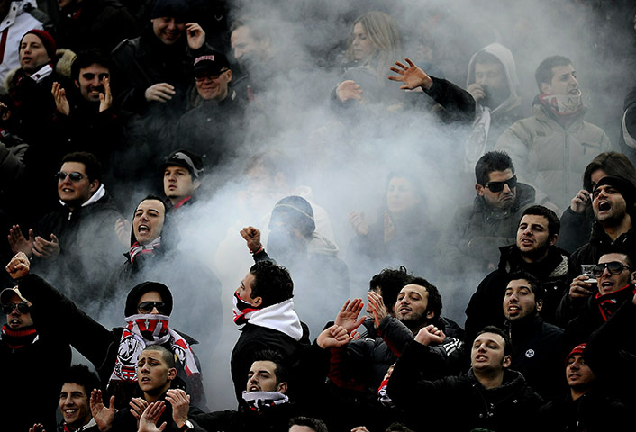 24 hours: Bologna, Italy: AC Milan's fans cheer their team 