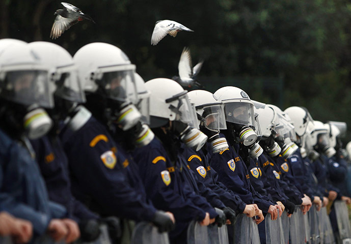 Riots in Athens: Riot policemen stand guard in front of the parliament in central Athens