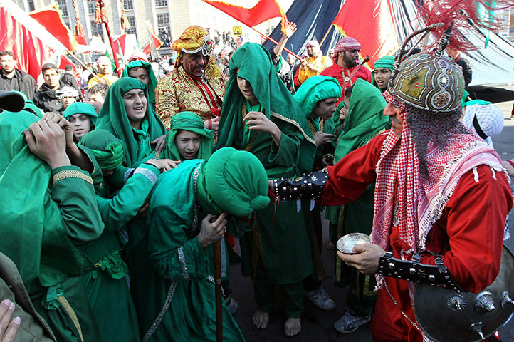 Ashura Religious Festival: Iranian Shiite Muslims take part in a ritual for Ashura in Iran
