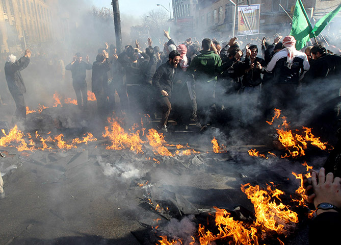 Ashura Religious Festival: Iranian Shiite Muslims burn down a tent during the Ashura commemorations