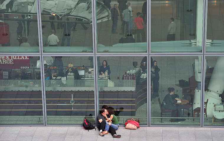 2010 year in science: A couple share a kiss outside Heathrow A