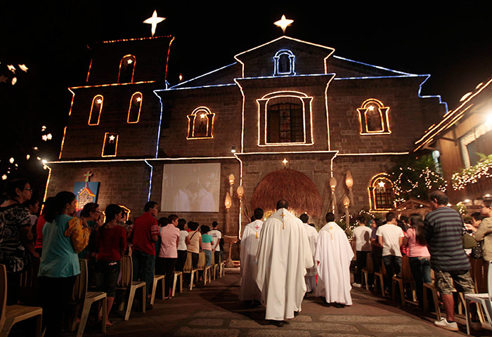 24 hours in pictures: Traditional Misa de Gallo (Dawn Mass) at a church in Las Pinas city