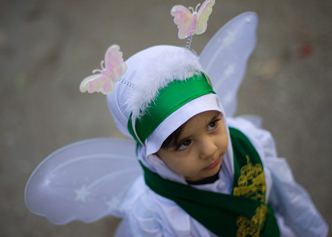 24 hours in pictures: A young girl at Ashura religious festival in Khorramabad